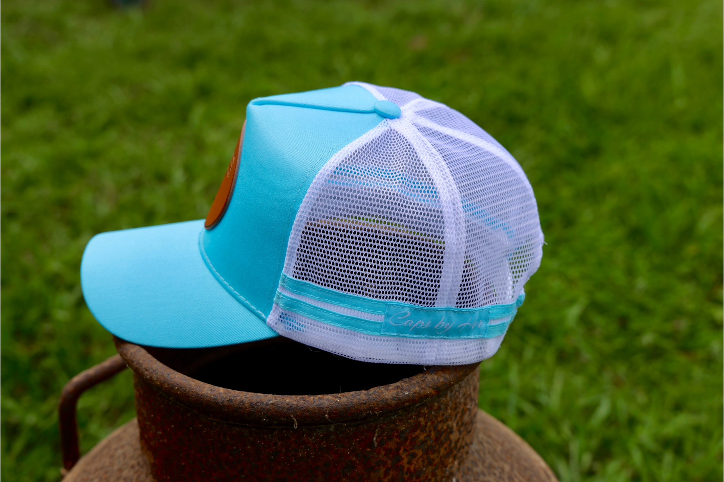 Buck ‘em Baby Blue Trucker Cap