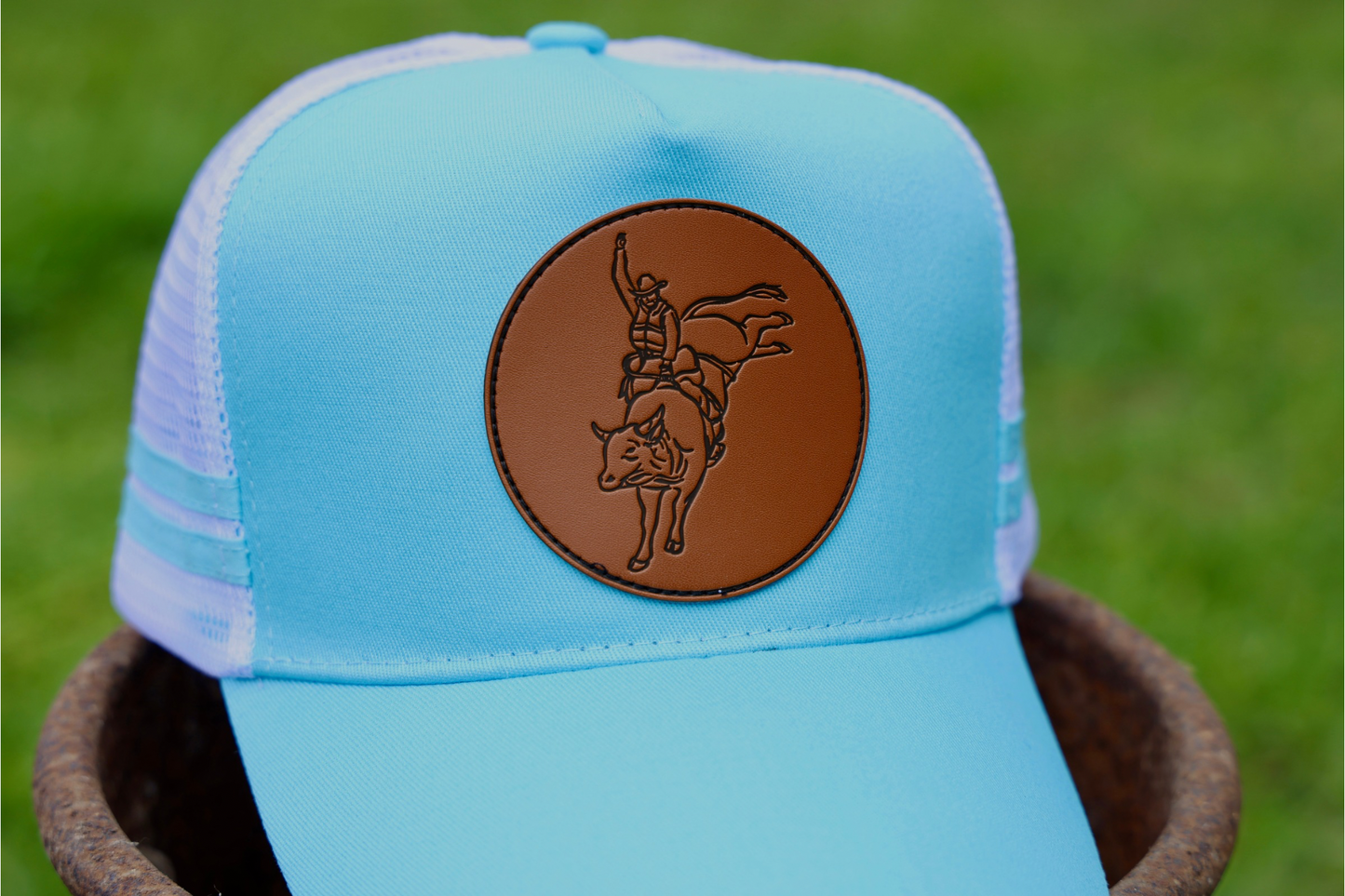 Buck ‘em Baby Blue Trucker Cap