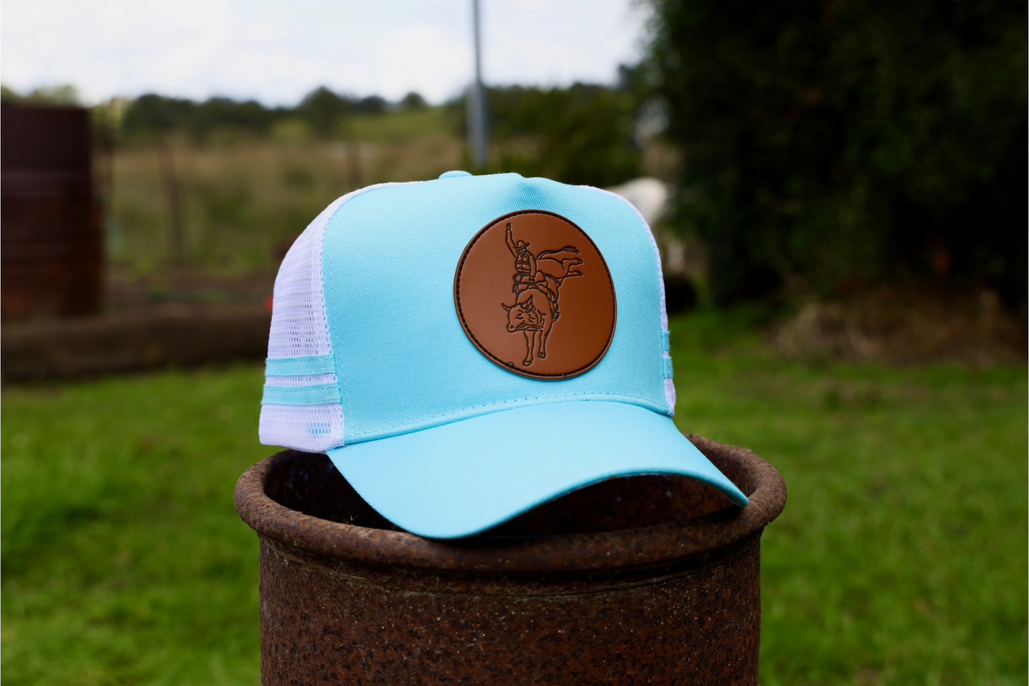 Buck ‘em Baby Blue Trucker Cap